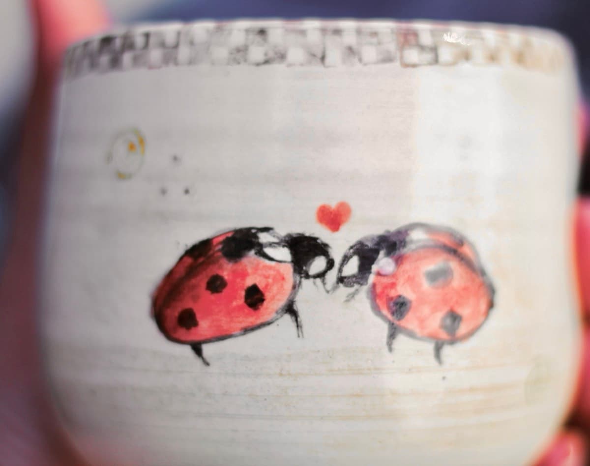 Ladybug mug with heart detail