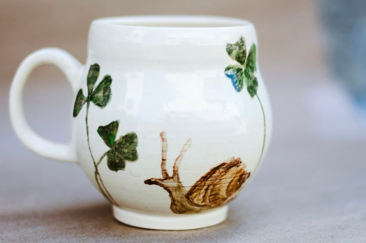 Snail and clover mug