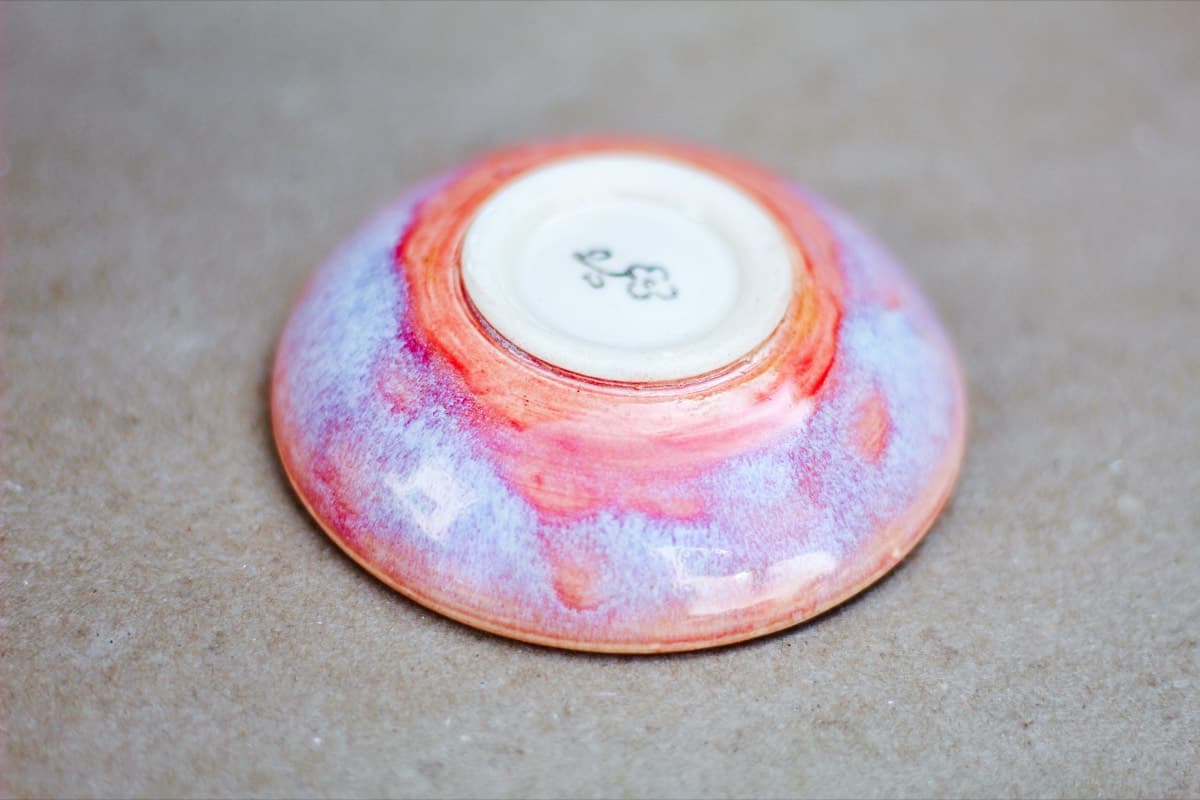 Pink and purple bowl bottom with stamp